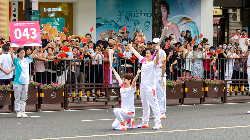 柯茜茜火炬交接造型。受訪者供圖